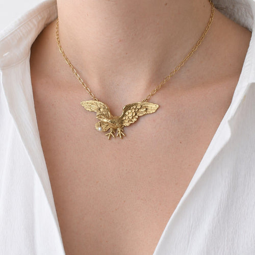 Collier Collier pendentif aigle en or jaune et perle 58 Facettes 36164