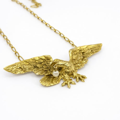 Collier Collier pendentif aigle en or jaune et perle 58 Facettes 36164
