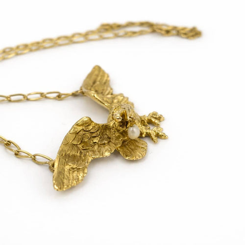Collier Collier pendentif aigle en or jaune et perle 58 Facettes 36164