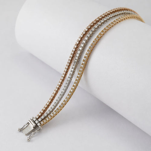 Bracelet Bracelet rivière en trois ors 18 carats et diamants 58 Facettes 36271