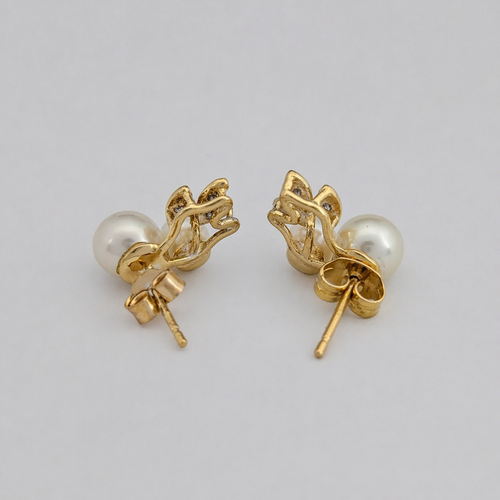 Boucles d'oreilles Boucles d’oreilles en or jaune et or blanc 18 carats, perles et diamants 58 Facettes 36550