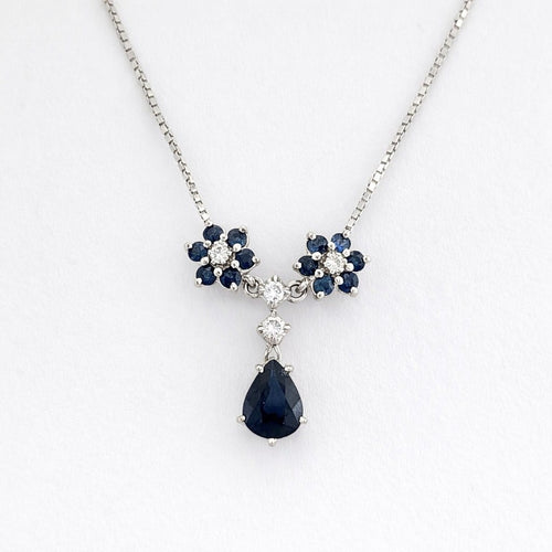 Collier Collier pendentif marguerite en or blanc, saphirs et diamants 58 Facettes 36249