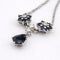 Collier Collier pendentif marguerite en or blanc, saphirs et diamants 58 Facettes 36249