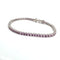 Bracelet Bracelet tennis en platine avec saphirs roses 58 Facettes BR/001
