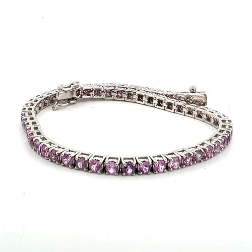 Bracelet Bracelet tennis en platine avec saphirs roses 58 Facettes BR/001