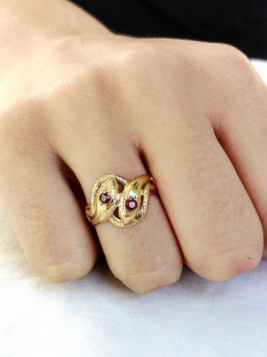 Bague 55.5 Bague serpent en or jaune 18 carats et rubis 58 Facettes id: 1754982