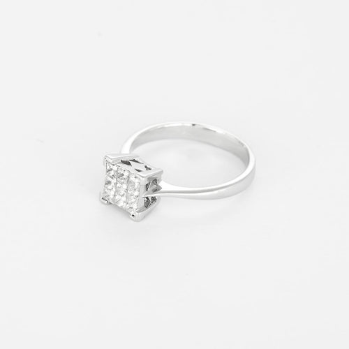 Bague 51 Bague moderniste en or gris et petits diamants princesse 58 Facettes 260274