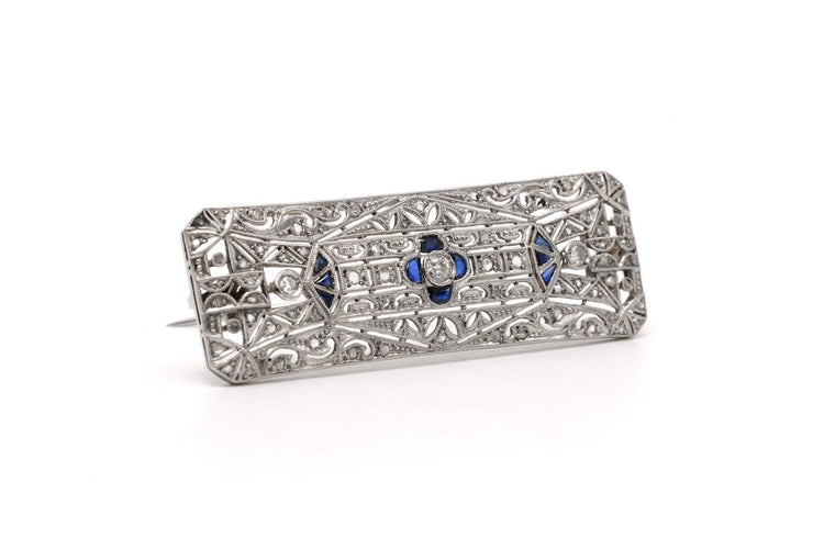 Broche Broche Art déco en or blanc 18 carats, saphirs et diamants 58 Facettes 23652