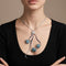 Collier Collier océan - Collier en or blanc saphirs, diamants et zircon 58 Facettes OC-63700140