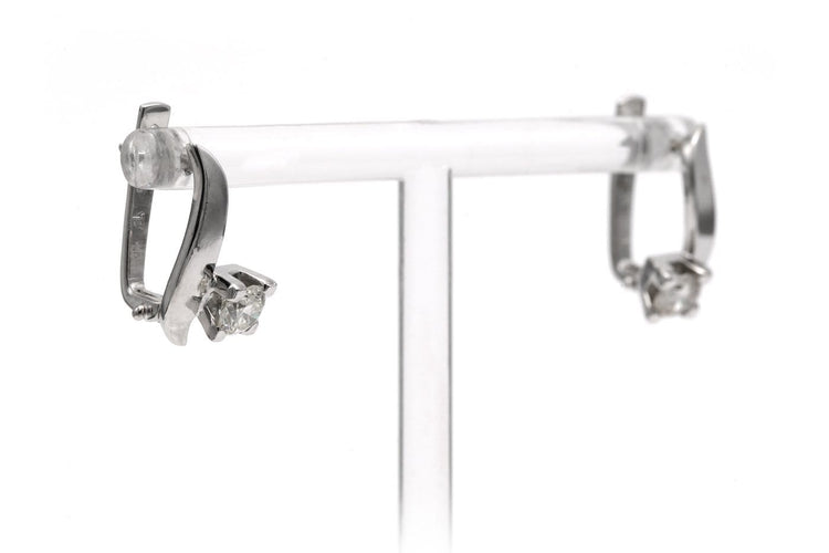 Boucles d'oreilles Boucles d'oreilles - Dormeuses en or blanc 18 carats et diamants 58 Facettes 23783