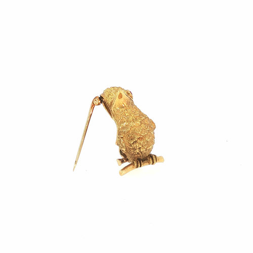 Broche Cartier - Broche oiseau vintage en or jaune 18 carats, rubis et diamants 58 Facettes 2.19476