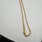 Collier Collier maille boules en or jaune 18k 58 Facettes #sh