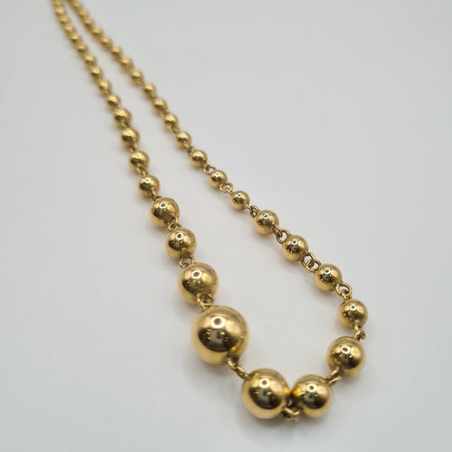 Collier Collier maille boules en or jaune 18k 58 Facettes #sh
