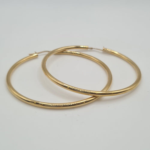 Boucles d'oreilles Boucles d'oreilles créoles en or jaune 18 carats 58 Facettes #BT