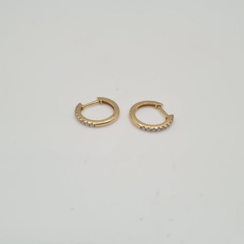 Boucles d'oreilles Créoles en or jaune 18k et diamants 58 Facettes #BT