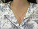 Collier pendentif POIRAY coeur entrelace pm en or rose 18k +chaine 9k boite 58 Facettes 274664