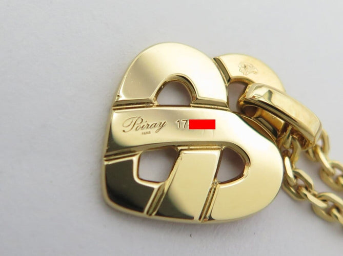 Collier pendentif POIRAY coeur entrelace pm en or rose 18k +chaine 9k boite 58 Facettes 274664