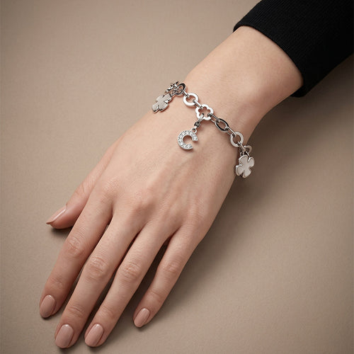 Bracelet Bracelet CHANEL avec charms Or gris et Diamants 58 Facettes OC-62100140