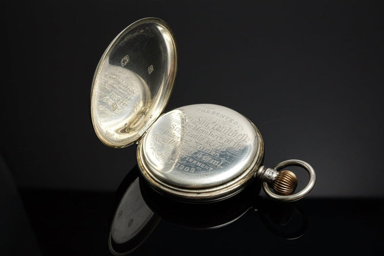 Montre Montre de poche anglaise œil-de-bœuf en argent 58 Facettes