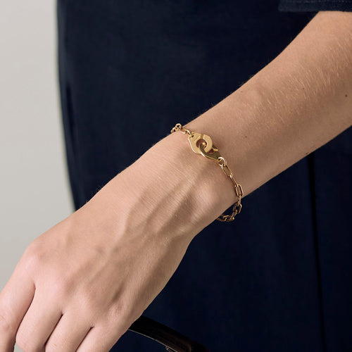 Bracelet Dinh Van Menottes R12 - Bracelet en or jaune 18 carats 58 Facettes BO/250011
