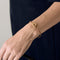 Bracelet Dinh Van Menottes R12 - Bracelet en or jaune 18 carats 58 Facettes BO/250011