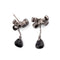 Boucles d'oreilles Pomellato - Boucles d'oreilles nœuds Forever en or gris noirci, onyx et diamants noirs 58 Facettes