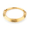 Bracelet Lalaounis - Bracelet jonc ouvrant martelé en or jaune 22k 58 Facettes 1