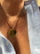 Collier Collier médaille symbolique de l'amour et de la réussite en or jaune 18 carats 58 Facettes Collier