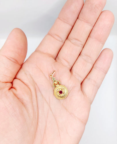 Pendentif Pendentif victorien en or rose 18k, grenat et décorations fleuries 58 Facettes A07105
