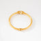 Bracelet Lalaounis - Bracelet jonc ciselé en or jaune 22K 58 Facettes 1