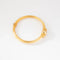 Bracelet Lalaounis - Bracelet jonc ciselé en or jaune 22K 58 Facettes 1