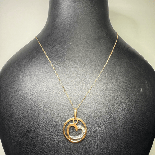 Pendentif cœur en or jaune 18 carats et pierres claires 58 Facettes 250020