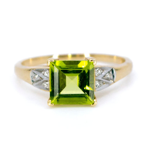 Bague 55 Bague en or jaune et blanc 14k, péridot et diamants 58 Facettes 40DC97C6E2BA45BC8F15258DE22E7AC9
