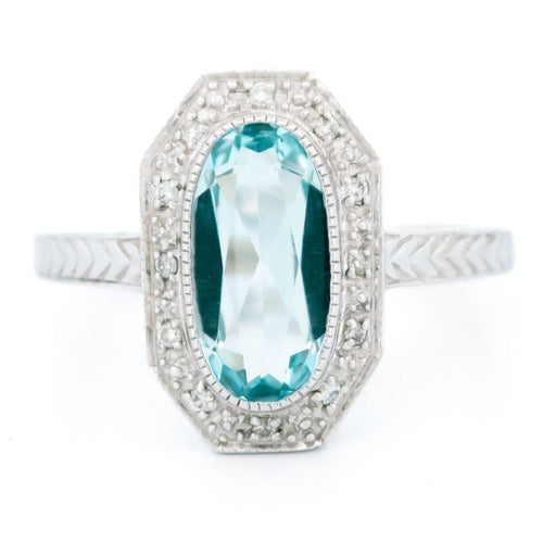 Bague 56 Bague ovale en or blanc 14k, topaze bleu clair et diamants 58 Facettes FE704B3808624DA49BC628A4D49E4FDD