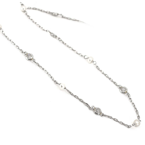 Collier Collier station en platine, perle d’Orient et diamant taille ancienne 58 Facettes F7080A7A8EFE4485A57B64D9592D7165