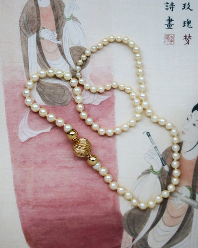 Collier Collier de perles de culture en or jaune 750 et fermoir boule 58 Facettes A11330 A11112