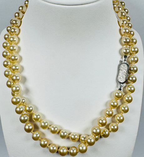 https://cdn.shopify.com/s/files/1/0829/5212/6812/files/Parel_ketting_1960S.jpg?v=1771445452