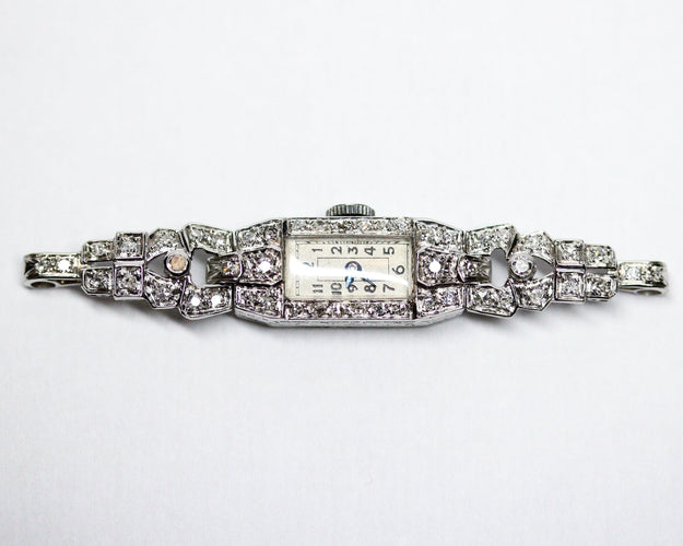 Montre Montre Art Déco en platine pavée de diamants 58 Facettes A11302