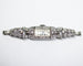 Montre Montre Art Déco en platine pavée de diamants 58 Facettes A11302