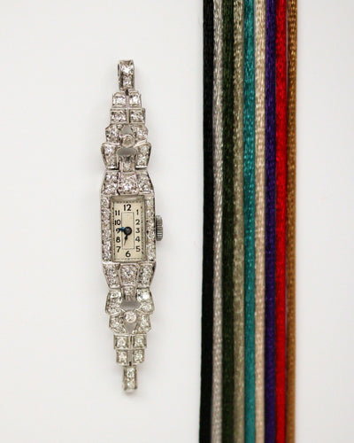 Montre Montre Art Déco en platine pavée de diamants 58 Facettes A11302