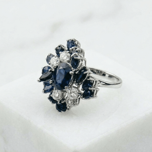 55 Bague en or blanc avec diamants et saphirs 58 Facettes 1601