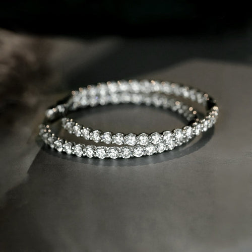 Boucles d'oreilles Embrace - Boucles d'oreilles créoles en or blanc et diamants 58 Facettes GER1054WG