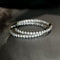 Boucles d'oreilles Embrace - Boucles d'oreilles créoles en or blanc et diamants 58 Facettes GER1054WG