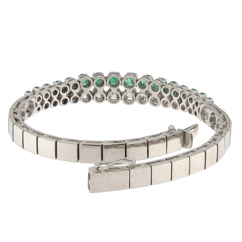 Bracelet Bracelet semi-rigide en or blanc, diamants et émeraudes 58 Facettes G3949