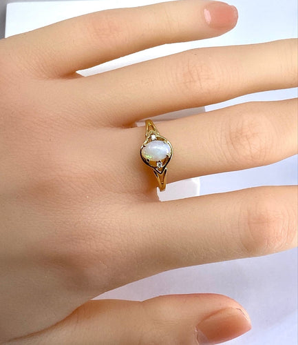Bague 54 Bague en or jaune 18 carats, opale et diamants 58 Facettes AB729