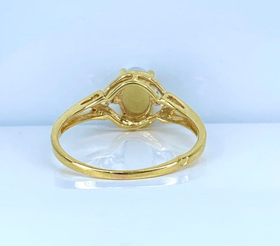 Bague 54 Bague en or jaune 18 carats, opale et diamants 58 Facettes AB729