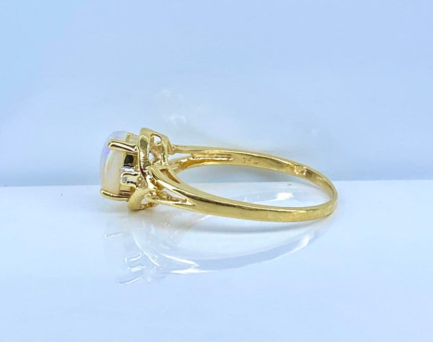Bague 54 Bague en or jaune 18 carats, opale et diamants 58 Facettes AB729