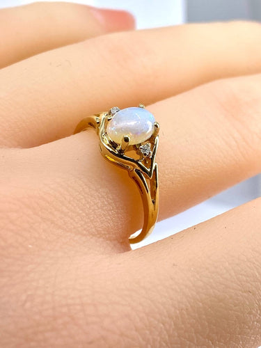 Bague 54 Bague en or jaune 18 carats, opale et diamants 58 Facettes AB729