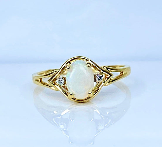 Bague 54 Bague en or jaune 18 carats, opale et diamants 58 Facettes AB729