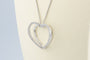 Collier Collier cœur en or blanc 18K et diamants 58 Facettes CL53500093-107